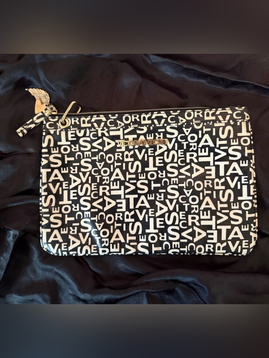 Victoria's Secret Handbags - Victoria's Secret, Coated canvas wristlet clutch